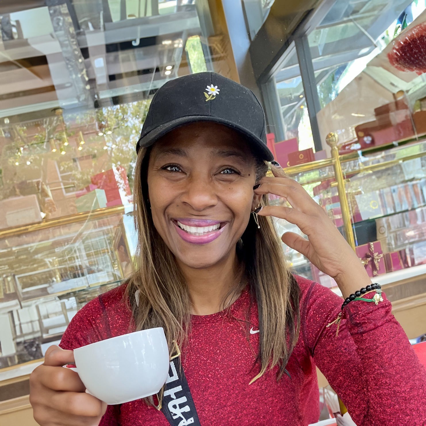 Lillian smiling with coffee